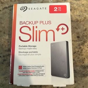 SEAGATE backup plus slim 2TB portable storage.
